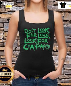 Stylish 'Don't Look For Love, Look For Champagne' tank top on display, perfect for casual outings and brunches.