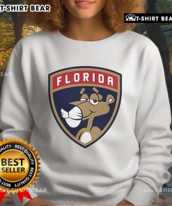 Alt Text: Stylish pink Florida Panthers logo sweatshirt featuring the team's emblem, perfect for fans and casual wear.