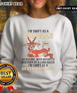 Cartoon goat in a sweatshirt saying 'I'm swift as a gazelle' humorously depicts an old goat with arthritis next to a Land Rover.