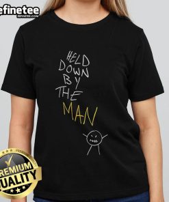 Stylish women's tee featuring 'Top Held Down By The Man' graphic design, perfect for casual wear and expressing individuality.