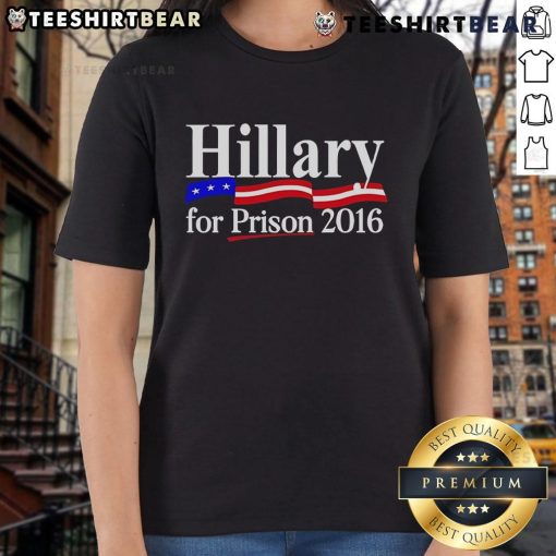 Top Hillary For Prison 2016 Ladies Tee featuring a bold graphic design, perfect for supporters and political statement wear.