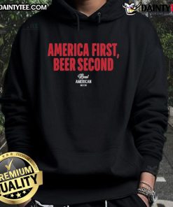 Alt Text: Top Hulk Hogan America First Beer Second Hoodie featuring bold text design, perfect for wrestling fans and patriotic apparel.