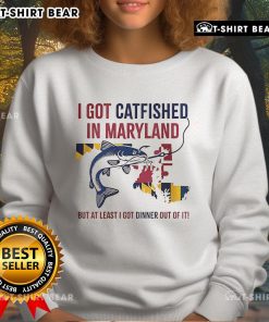 Alt Text: Cozy 'Top I Got Catfished in Maryland' sweatshirt displayed on a hanger, perfect for fans of humorous fashion.