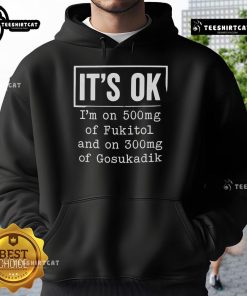 Cozy hoodie featuring 'I'm On 500mg of Fukitol and 300mg of Gosukadik' graphic, perfect for casual wear and humor.