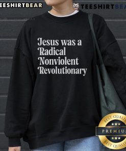 Top Jesus Was A Radical Nonviolent Revolutionary Sweatshirt featuring bold text design on a cozy fabric background.