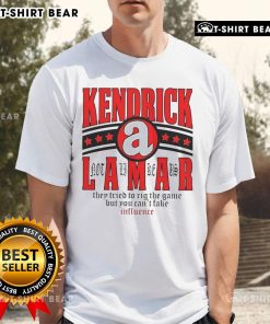 Alt Text: Top Kendrick Lamar 'They Tried To Rig The Game But You Can't Fake' T-Shirt featuring bold artwork and lyrics.