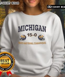Alt Text: 2023 Michigan Wolverines National Champions sweatshirt in maize and blue, celebrating the team's championship win.