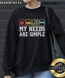 Alt Text: Cozy sweatshirt featuring My Needs Are Simple: Ramen, Video Games, Music, Sleep design for gamers and comfort lovers.