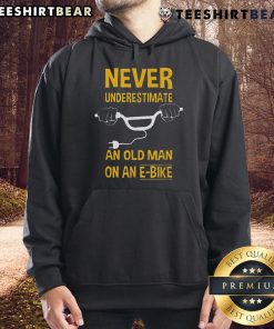 Top Never Underestimate An Old Man On An E-Bike Hoodie featuring a bold graphic design and comfortable fit for e-bike enthusiasts.