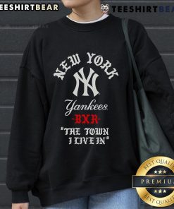 Alt Text: Top New York Yankees Raised in New York Town sweatshirt featuring classic logo, perfect for fans and casual wear.
