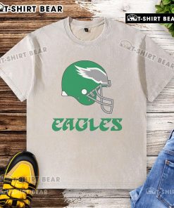 Alt Text: Top Philadelphia Eagles E-A-G-L-E-S pullover washed t-shirt for fans, featuring team logo and comfortable fit.