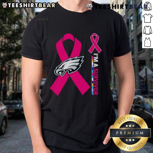 Alt Text: Top Philadelphia Eagles X Cancer Awareness 'I'M A Survivor' T-Shirt featuring vibrant team colors and empowering message.