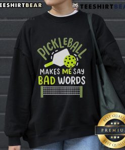 Cozy sweatshirt featuring 'Top Pickleball Makes Me Say Bad Words' design, perfect for pickleball enthusiasts.
