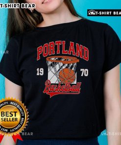 Vintage 1970s ladies tee featuring a Portland basketball graphic, perfect for retro sports enthusiasts.