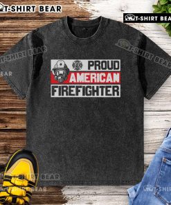Top Proud American Firefighter Washed T-Shirt featuring a bold firefighter graphic and patriotic colors.