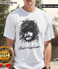Top Shane MacGowan self-portrait t-shirt featuring vibrant artwork of the iconic musician, perfect for fans of his music.
