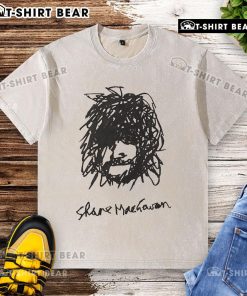 Alt Text: Self-portrait of Shane MacGowan wearing a washed t-shirt, showcasing his unique style and artistic expression.