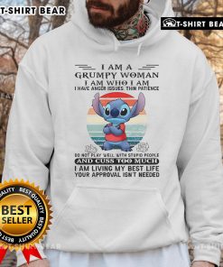 Grumpy woman wearing a 'I Am Grumpy' hoodie showcasing humor and personality with a stylish top-stitch design.