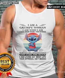 Alt Text: Grumpy woman wearing a Top Stitch I Am Grumpy tank top, showcasing anger issues with a bold graphic design.