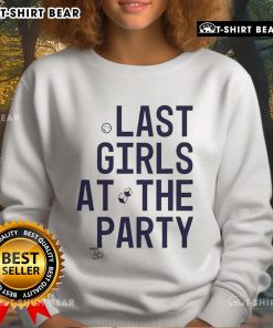 Group of girls in 'Top The Beaches' sweatshirts enjoying a lively party at the beach, showcasing fun summer vibes.