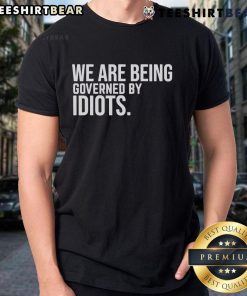 Top We Are Being Governed By Idiots T-Shirt featuring bold text design, perfect for expressing political frustration.