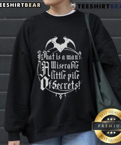 Alt Text: Top What Is A Man? A Miserable Little Pile Of Secrets Sweatshirt featuring a bold graphic design on a cozy fabric.
