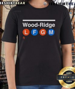 Top Wood Ridge LFGM Ladies Tee featuring a stylish design for women golfers, perfect for enhancing performance on the course.