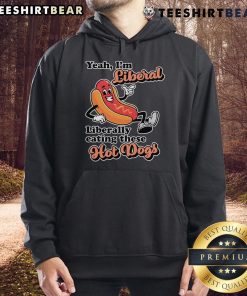 Person wearing a 'Top Yeah I'm Liberal' hoodie while enjoying hot dogs at a picnic, showcasing a fun liberal lifestyle.