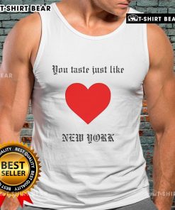 Stylish Top You Taste Just Like New York tank top featuring a vibrant NYC graphic on a casual background.
