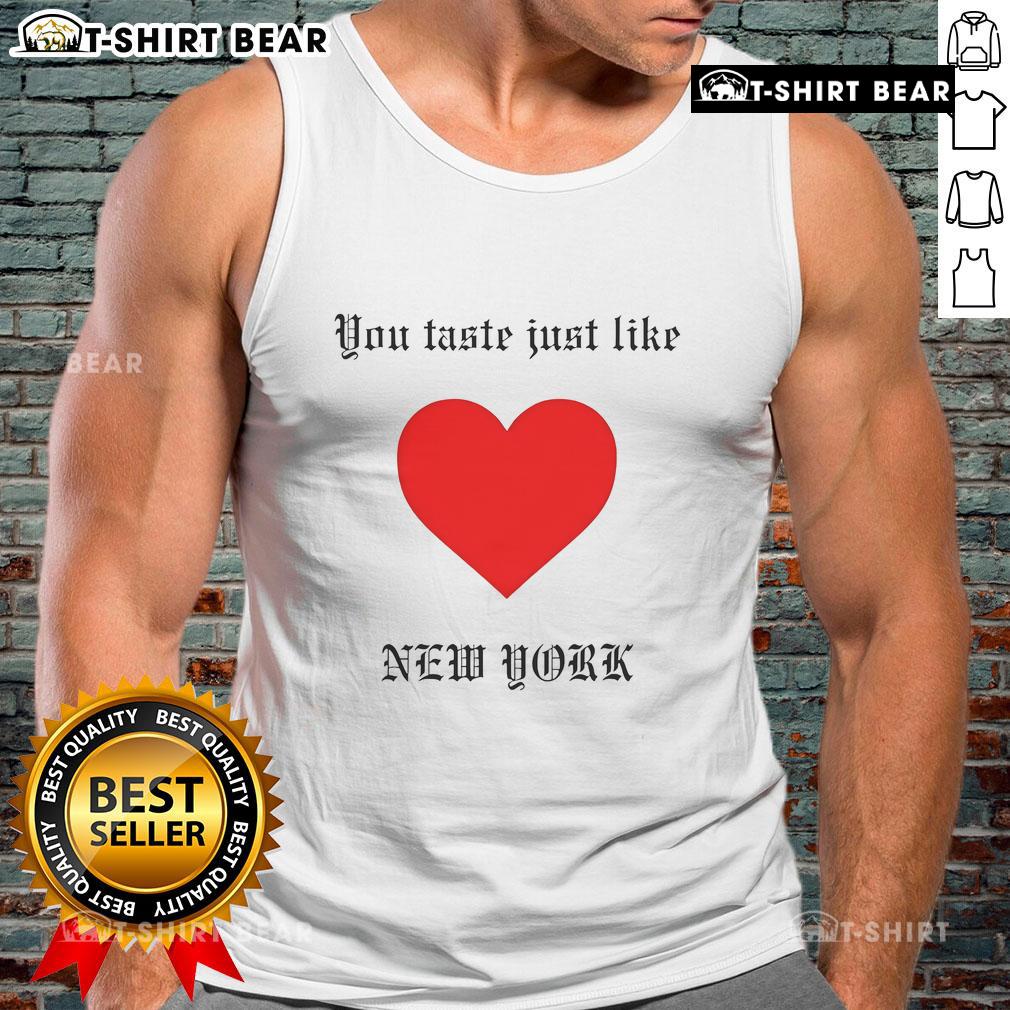Top You Taste Just Like New York Tank Top Stylish Top You Taste Just Like New York tank top featuring a vibrant NYC graphic on a casual background.
