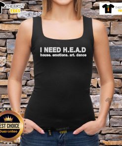 Woman wearing a 'Nice I Need Head' tank top, dancing joyfully, showcasing vibrant emotions and art-inspired fashion.