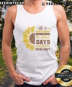 Sunflower tank top featuring an inspiring quote, perfect for brightening dark days and finding sunlight. Shop now!
