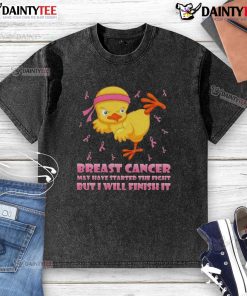 Awesome cartoon chick performing a karate kick on a washed t-shirt, symbolizing strength in the fight against breast cancer.