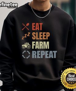 Vintage sweatshirt featuring 'Eat Sleep Farm Repeat' design for farmers, perfect for casual wear and farm lifestyle.