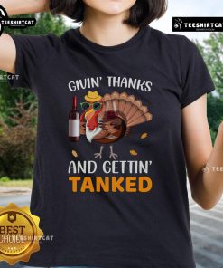 Awesome Givin Thanks and Gettin Tanked Ladies Tee showcasing a fun Thanksgiving design on a stylish women's shirt.