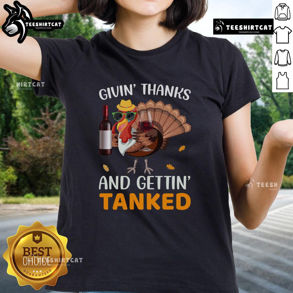 Awesome Givin' Thanks And Gettin' Tanked Ladies Tee Awesome Givin Thanks and Gettin Tanked Ladies Tee showcasing a fun Thanksgiving design on a stylish women's shirt.