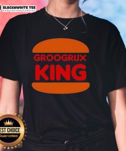 Awesome GrooGrux King logo on a stylish ladies tee, perfect for fans of the iconic band and trendy fashion.
