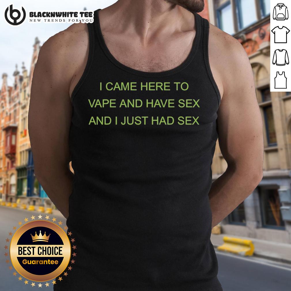 Awesome I Came Here To Vape And Have Sex And I Just Had Sex Tank Top Person wearing 'I Came Here To Vape And Have Sex' tank top, enjoying a relaxed atmosphere at a vape lounge.