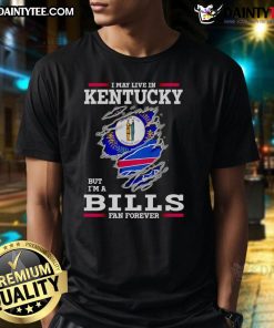 Awesome Buffalo Bills fan T-shirt: 'I May Live In Kentucky But I'M A Buffalo Bills Fan Forever' design for true fans.