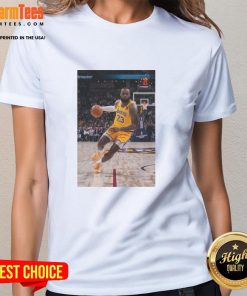 LeBron James in a striking pose wearing a Los Angeles Lakers jersey number 23 on a stylish ladies tee.