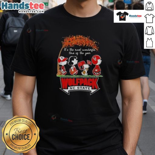 Alt Text: Awesome Peanuts It's The Most Wonderful Time Of The Year Wolfpack NC State T-Shirt featuring festive graphics.