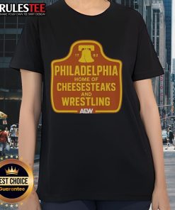 Vintage ladies tee featuring the iconic Philadelphia home of cheesesteaks and wrestling, perfect for fans and collectors.