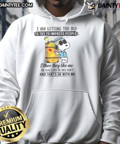 Snoopy hoodie with 'I Am Getting Too Old to Try to Impress People' text, perfect for casual and comfortable style.
