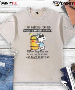 Alt Text: Awesome Snoopy I Am Getting Too Old to Try to Impress People washed t-shirt, featuring a playful Snoopy graphic.