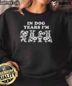 Awesome Snoopy in Dog Years I'm Dead sweatshirt featuring a playful Snoopy graphic for dog lovers and fans.