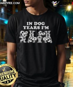 Awesome Snoopy In Dog Years I'M Dead T-Shirt featuring a playful Snoopy graphic, perfect for Peanuts fans.