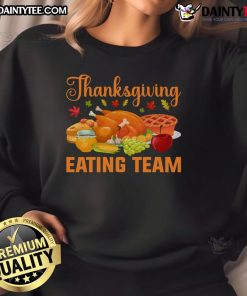 Awesome Thanksgiving Eating Team sweatshirt featuring food lovers enjoying a festive turkey day feast.