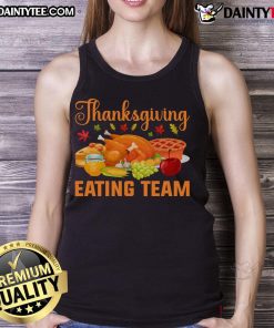 Awesome Thanksgiving eating team wearing turkey day feast tank tops, celebrating food lovers' joy during the holiday.