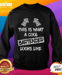 Cool bartender wearing 'Awesome! This Is What A Cool Bartender Looks Like' sweatshirt, serving drinks with style.