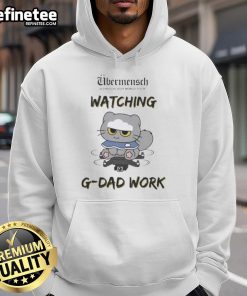 Alt Text: G-Dragon in a stylish hoodie from the 2025 World Tour, watching his dad work, showcasing the Awesome Ubermensch vibe.